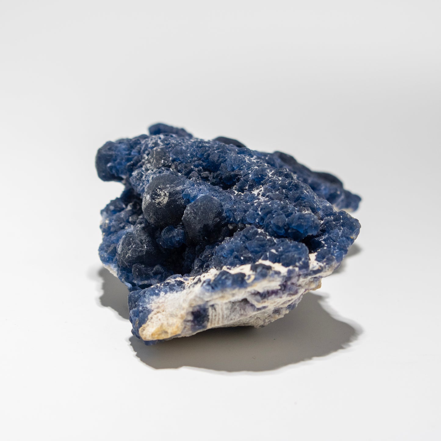 Blue crystal rock on a white background