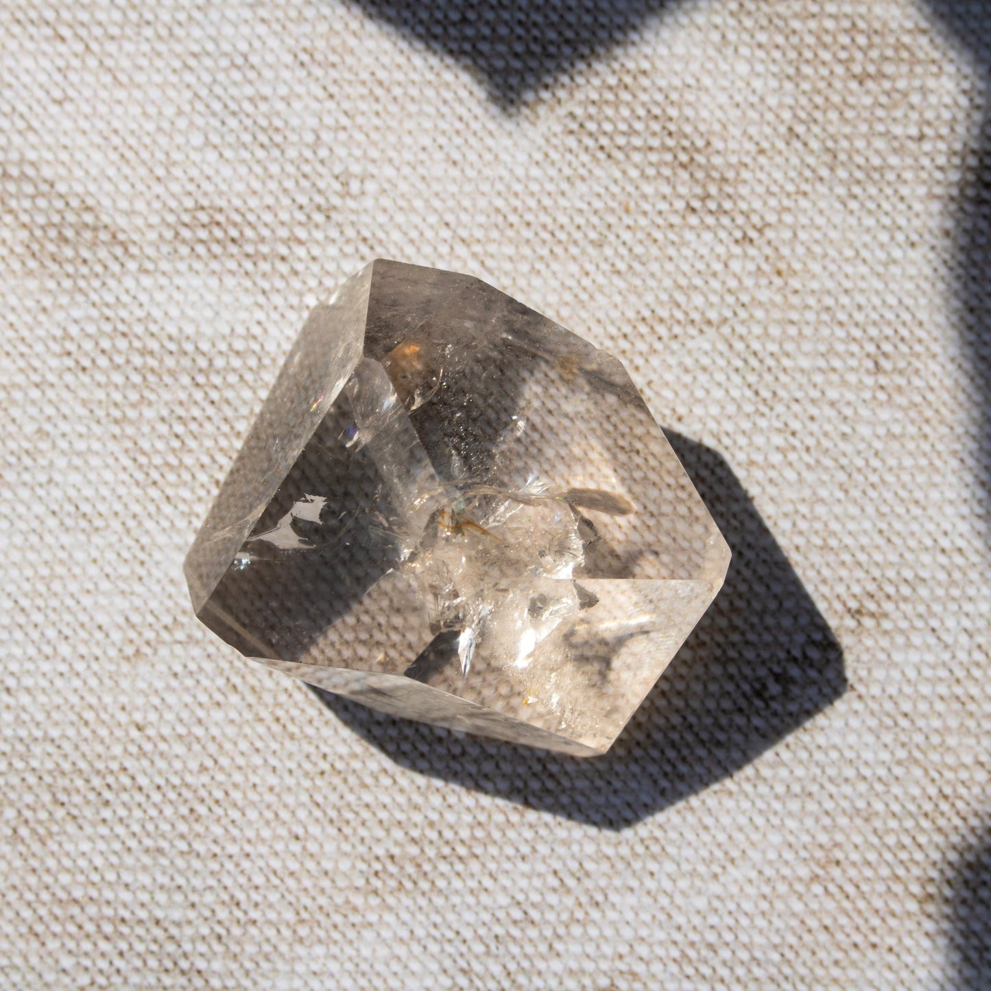 Crystal on a textured fabric background