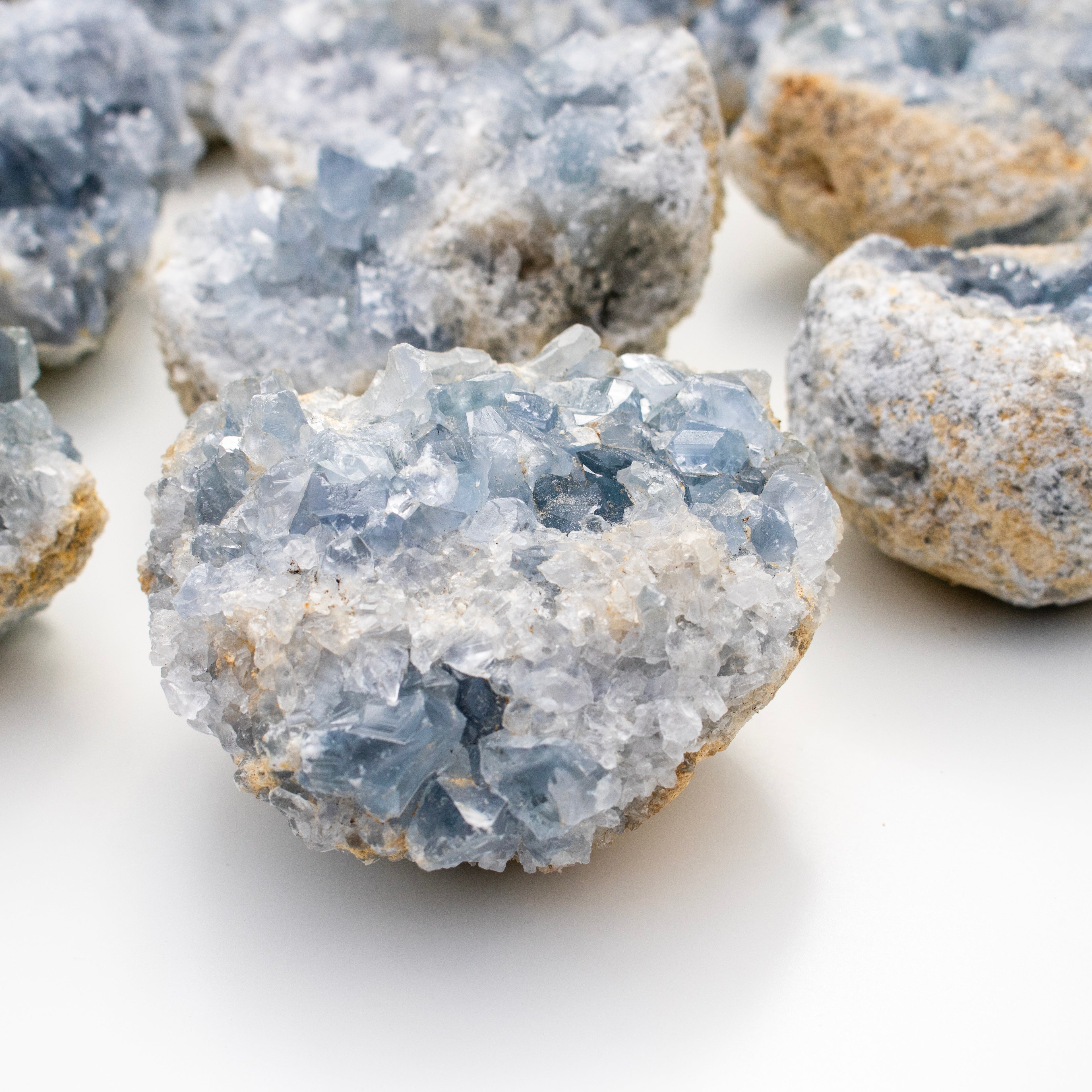 Close-up of blue crystal rock on a white background