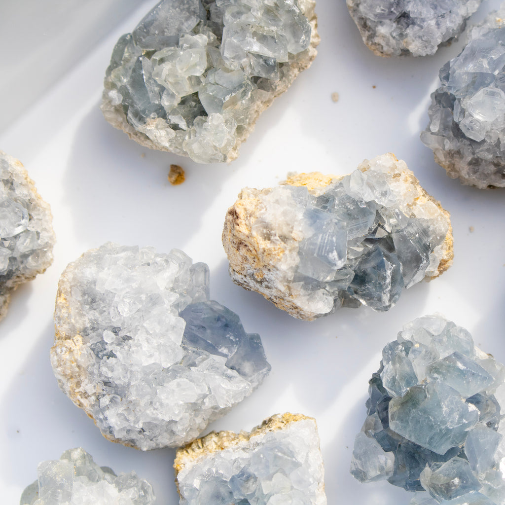 Close-up of various crystal rocks on a white background