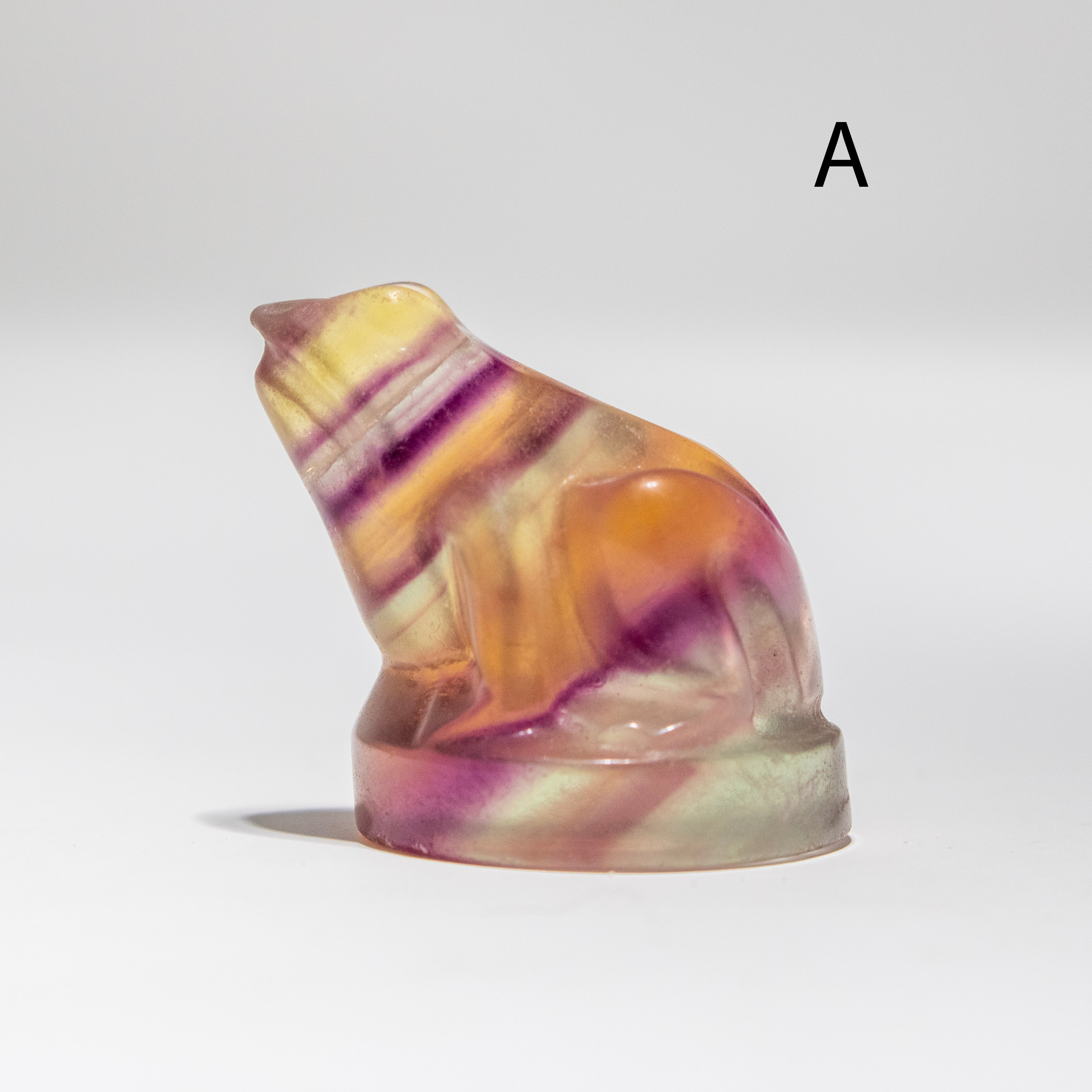 Marbled stone sculpture on a white background