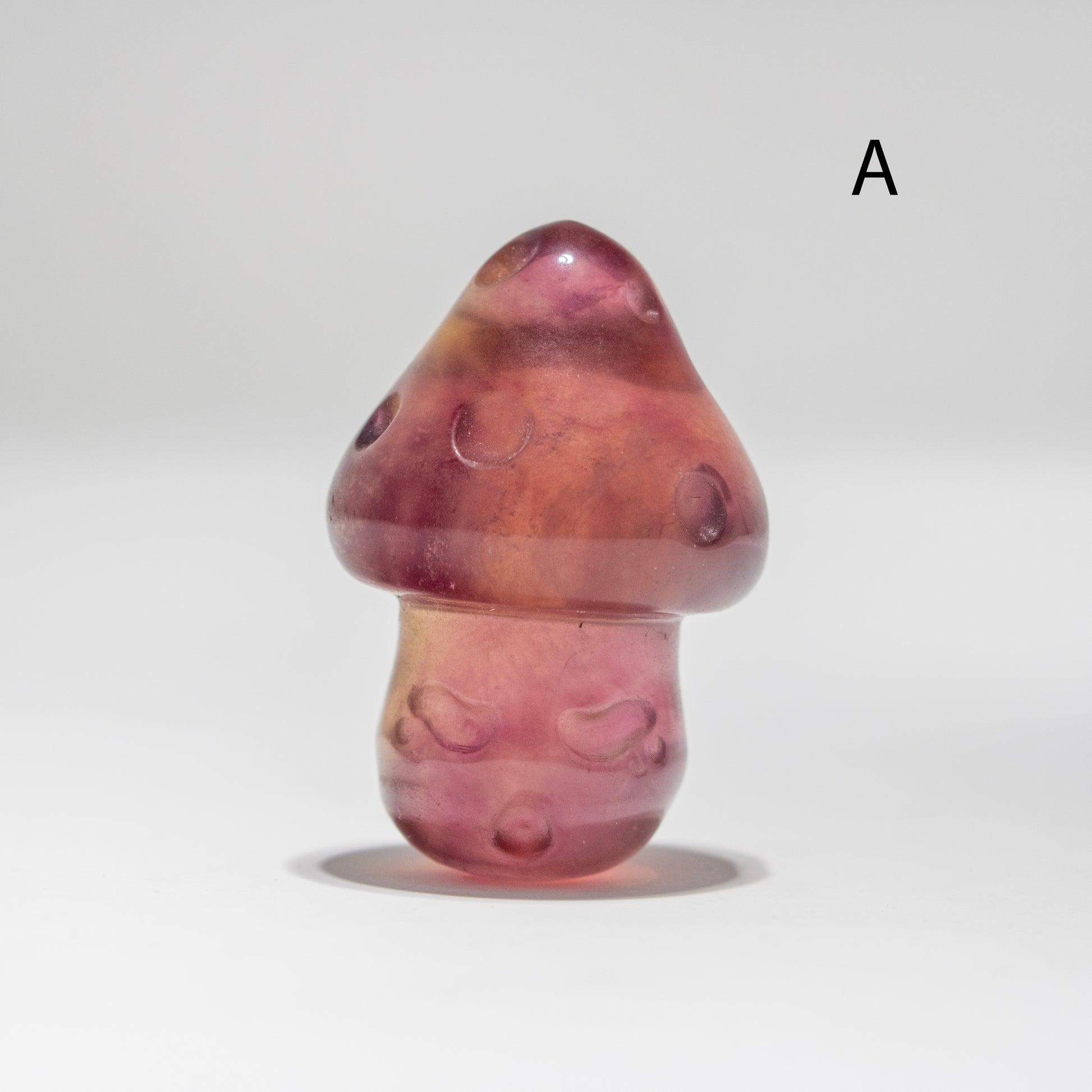 Fluorite mushroom-shaped object on a white background
