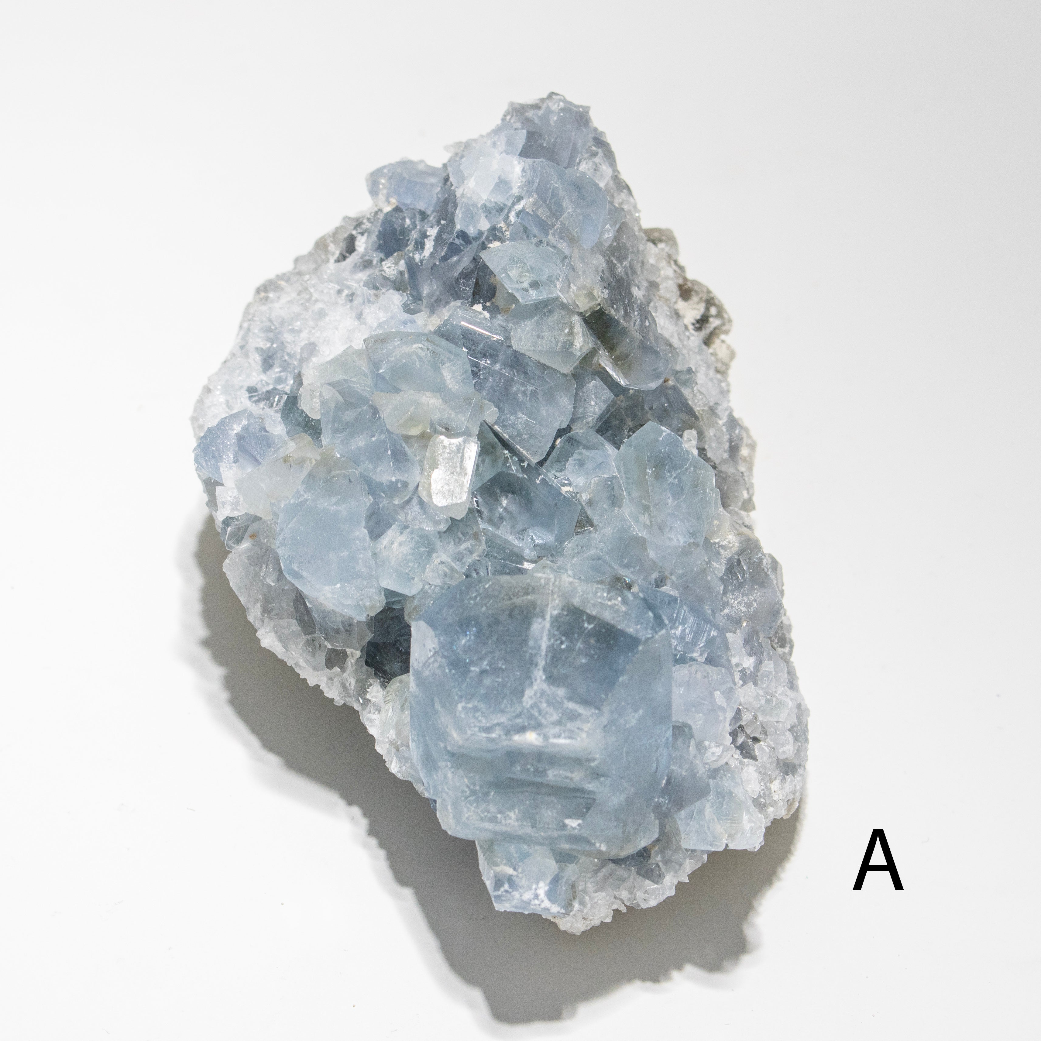 Blue crystal cluster on a white background