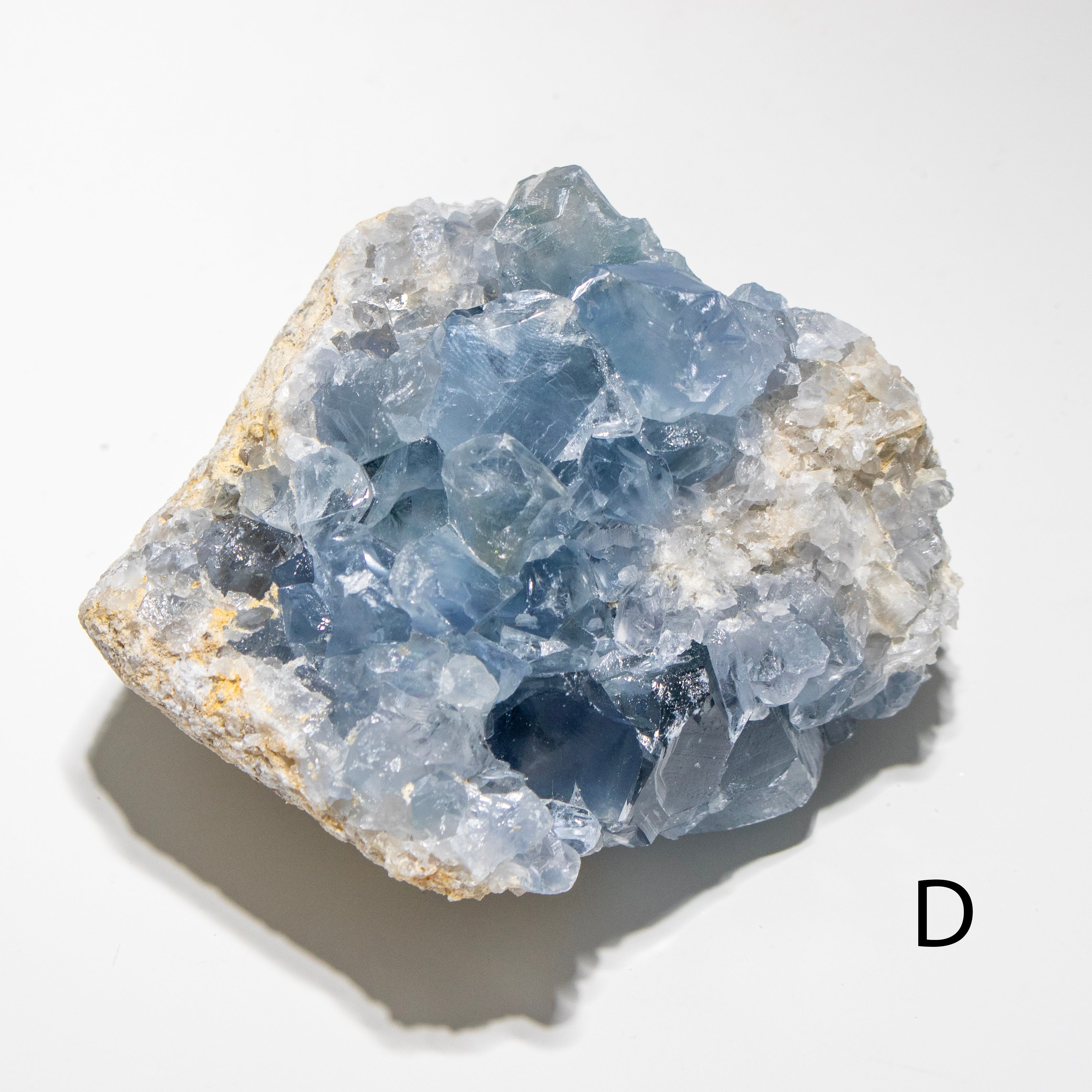 Blue crystal cluster on a white background