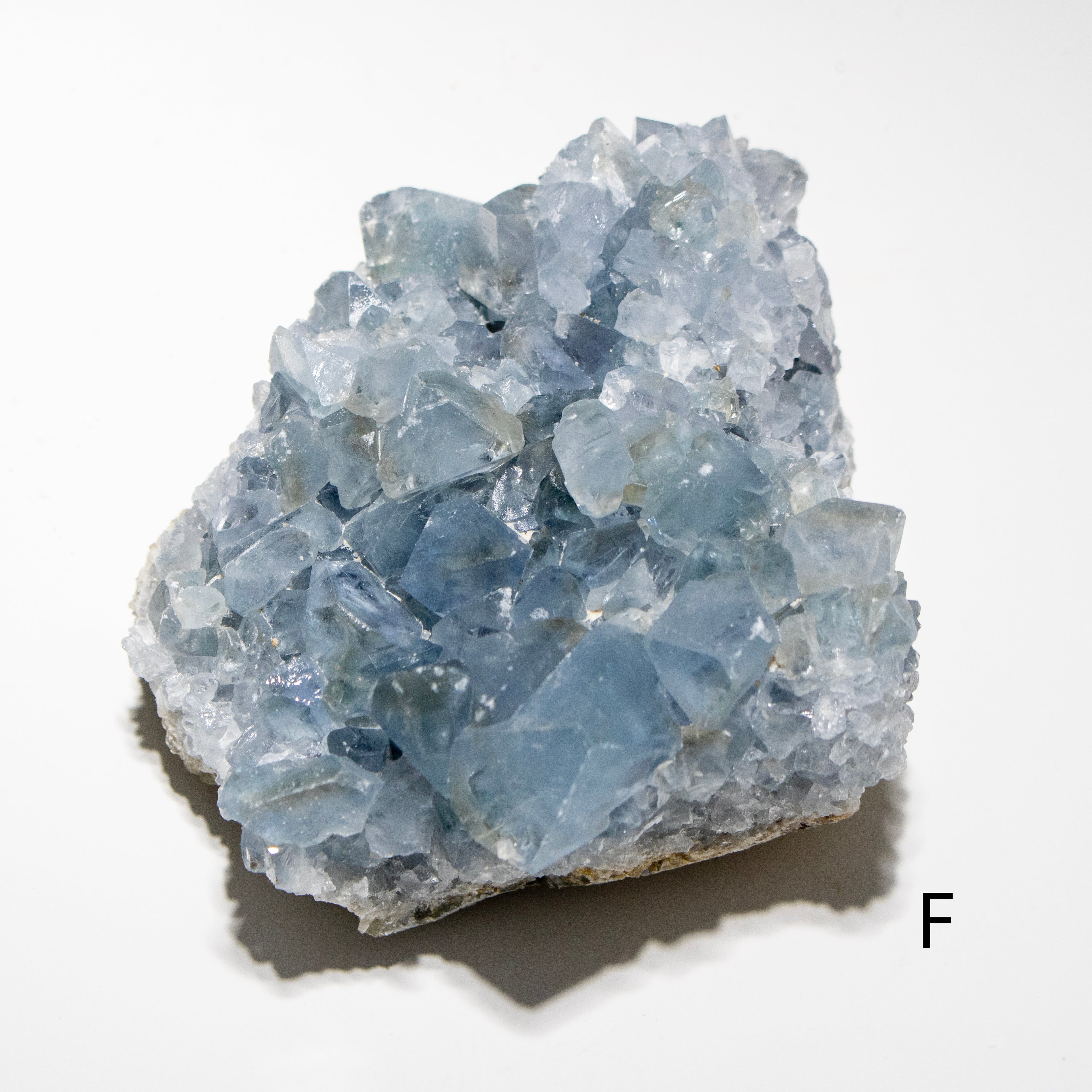 Blue crystal cluster on a white background