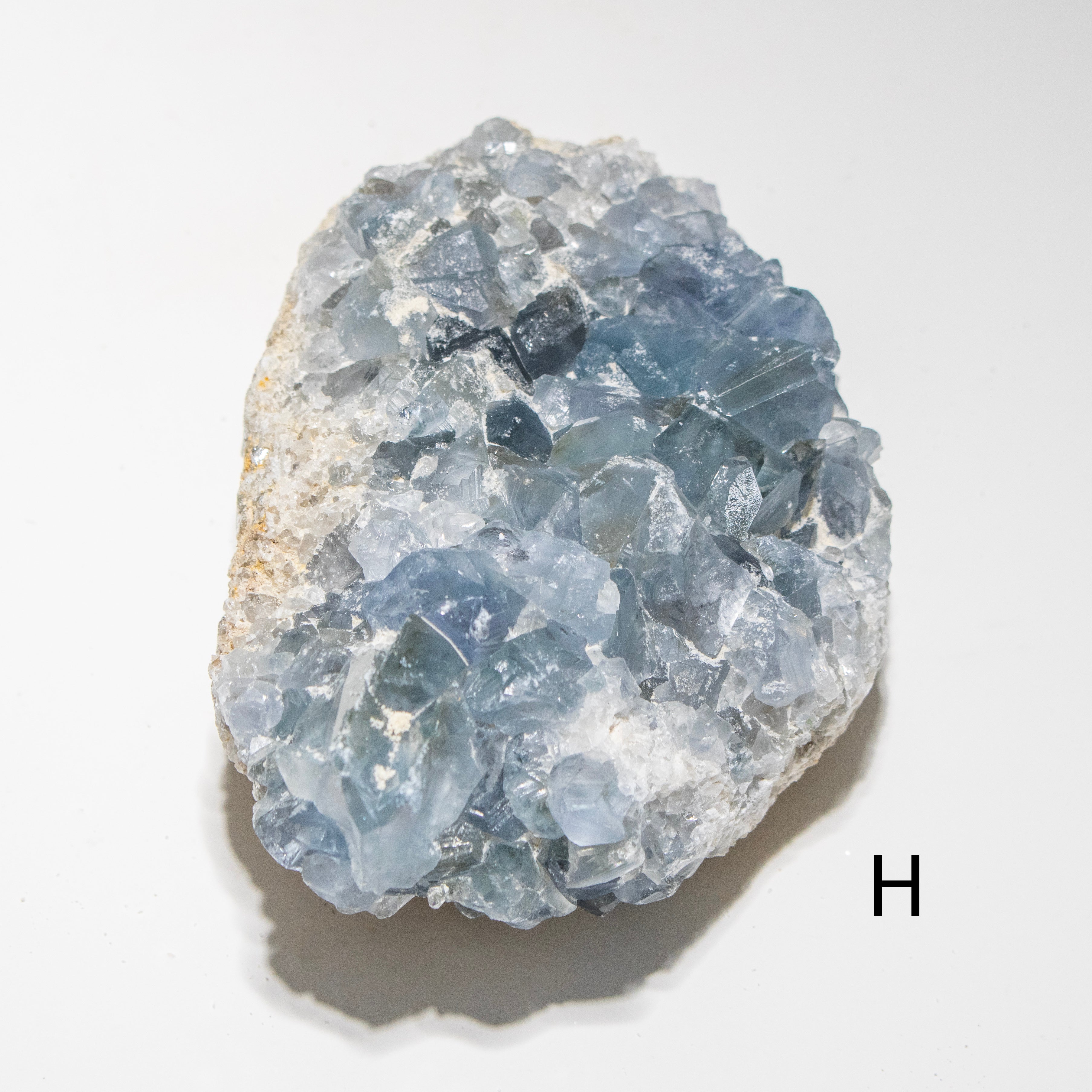 Blue crystal rock on a white background