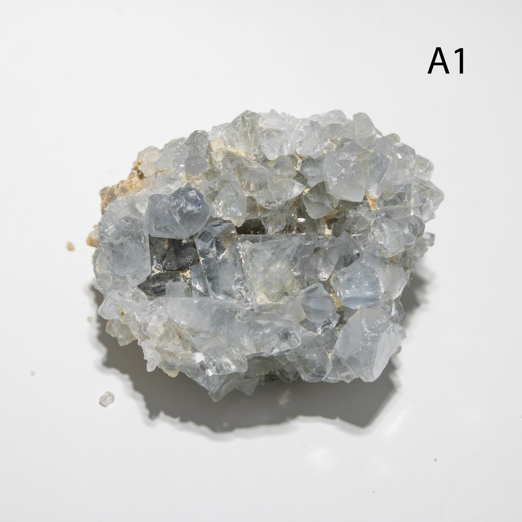 Crystal cluster on a light gray background