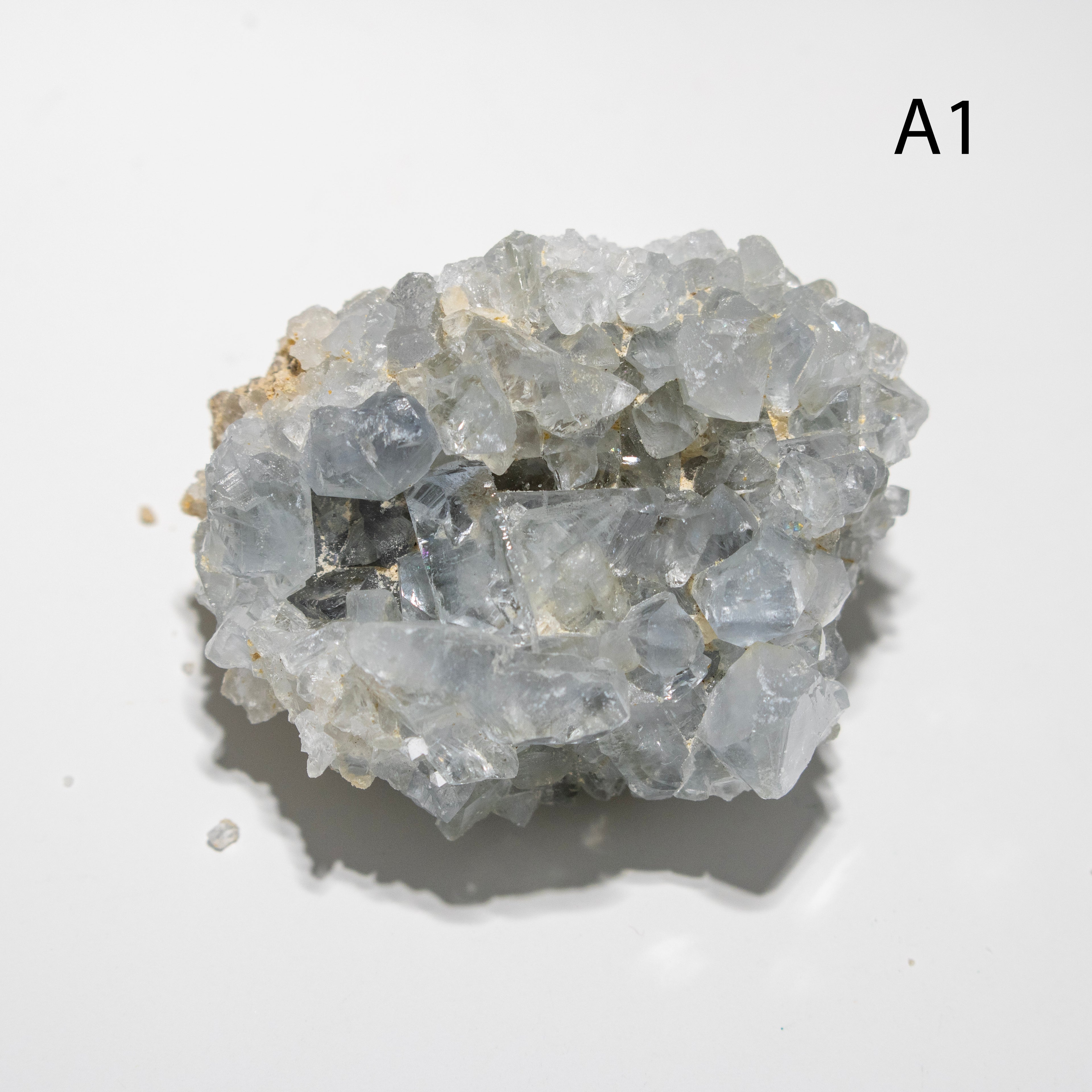 Crystal cluster on a light gray background