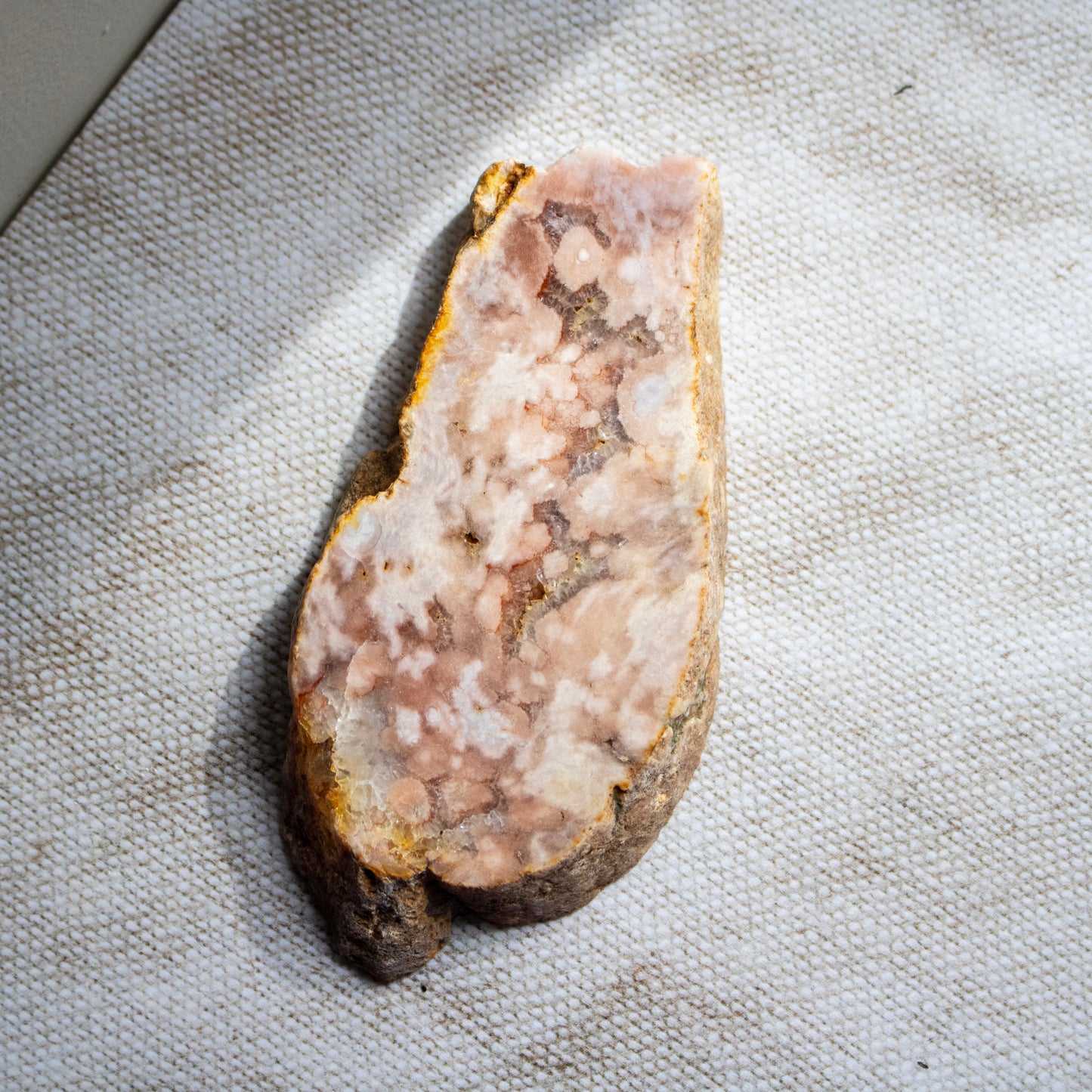 Mineral sample on a textured fabric background