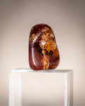 a russet brown small stone