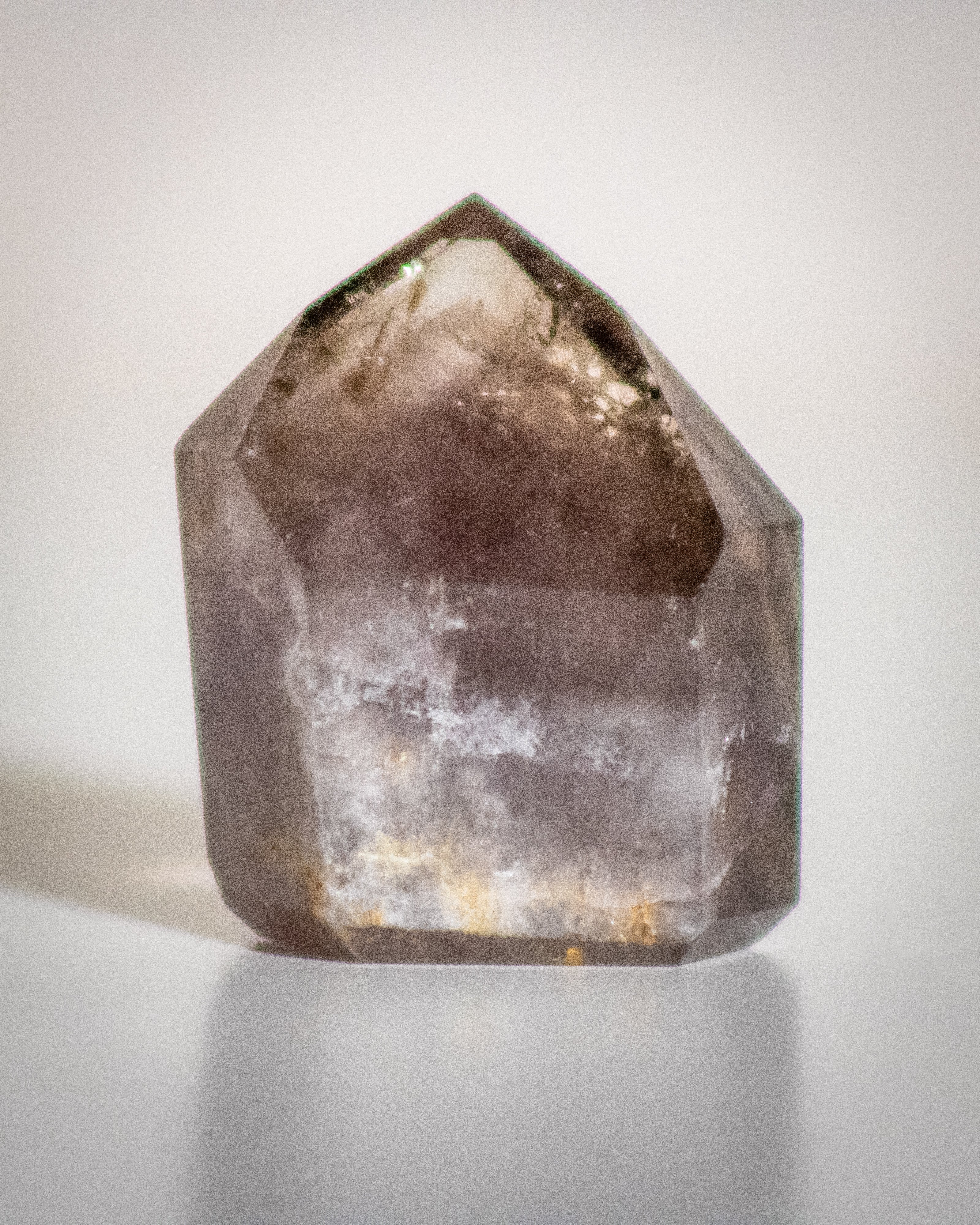 dark translucent black and purple crystal tower point