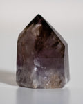 dark translucent black and purple crystal tower point