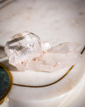 Clear crystal on a marble surface