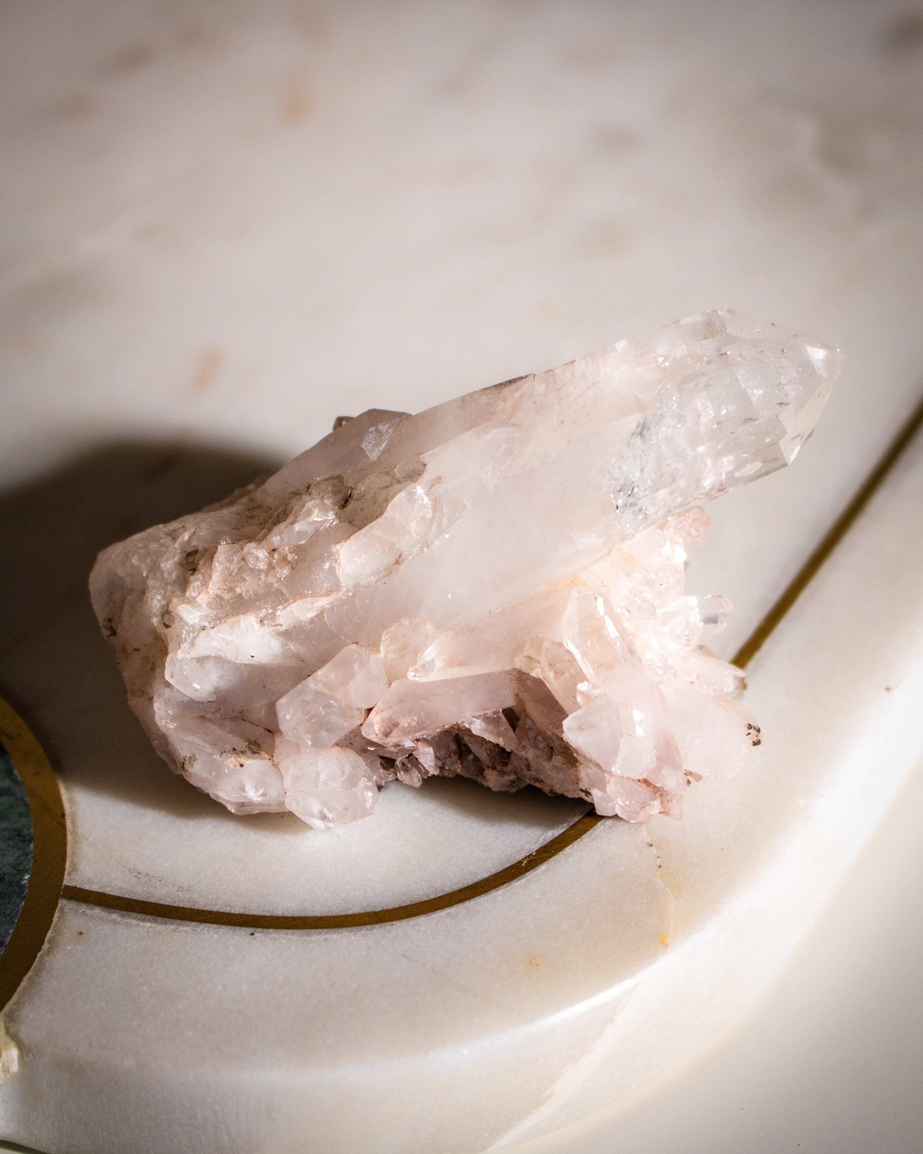 Crystal rock on a marble surface