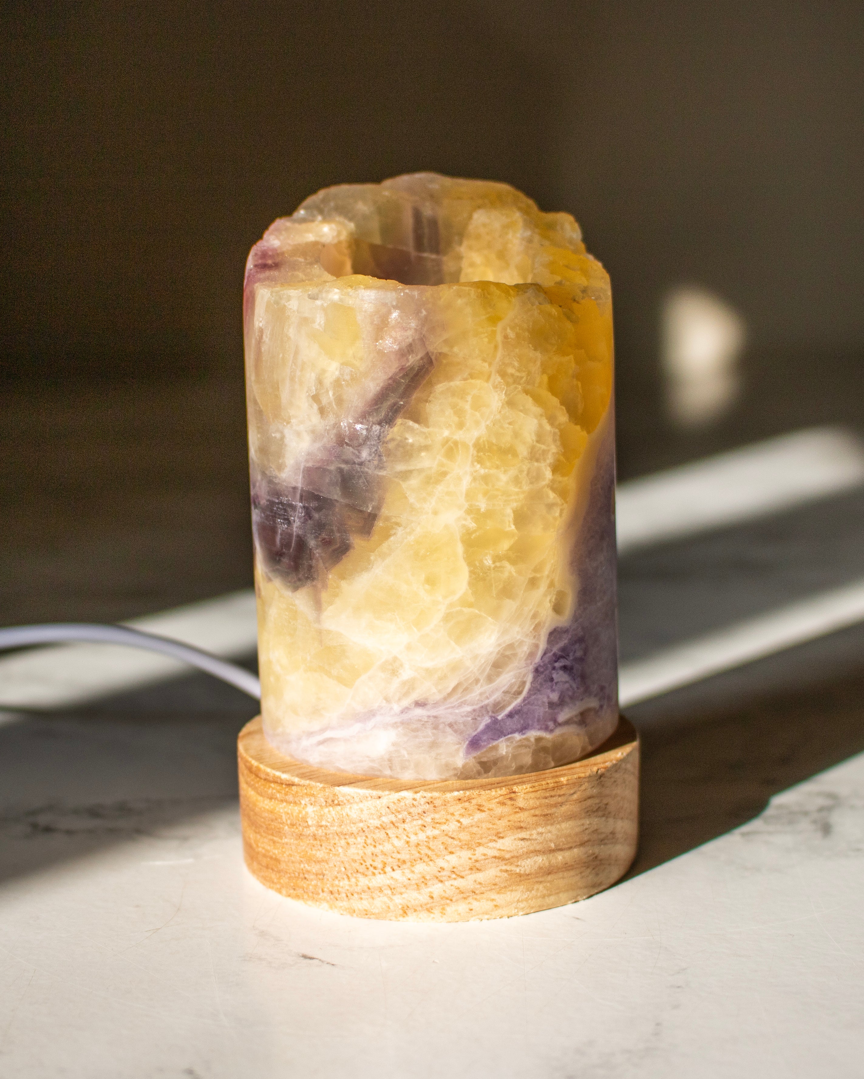 Decorative lamp with a natural stone design on a marble surface