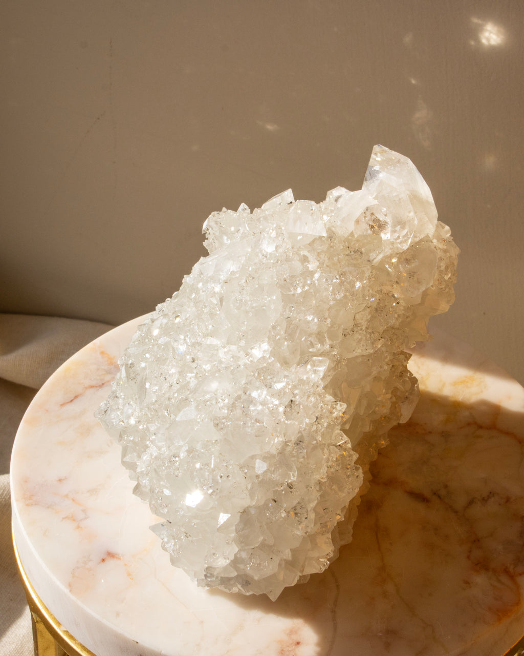Crystal formation on a marble surface with a neutral background