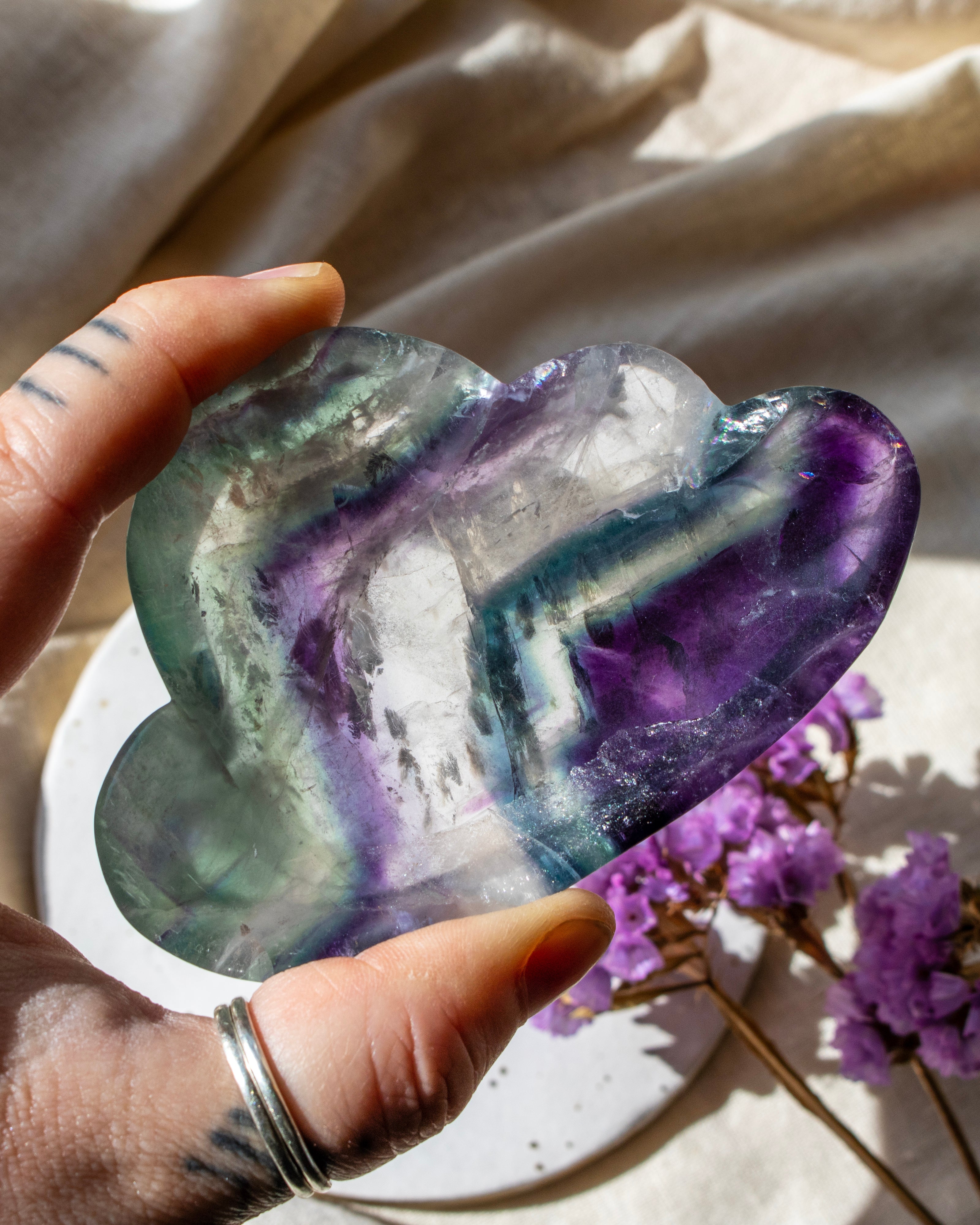 green and purple stone cloud with purple flowers