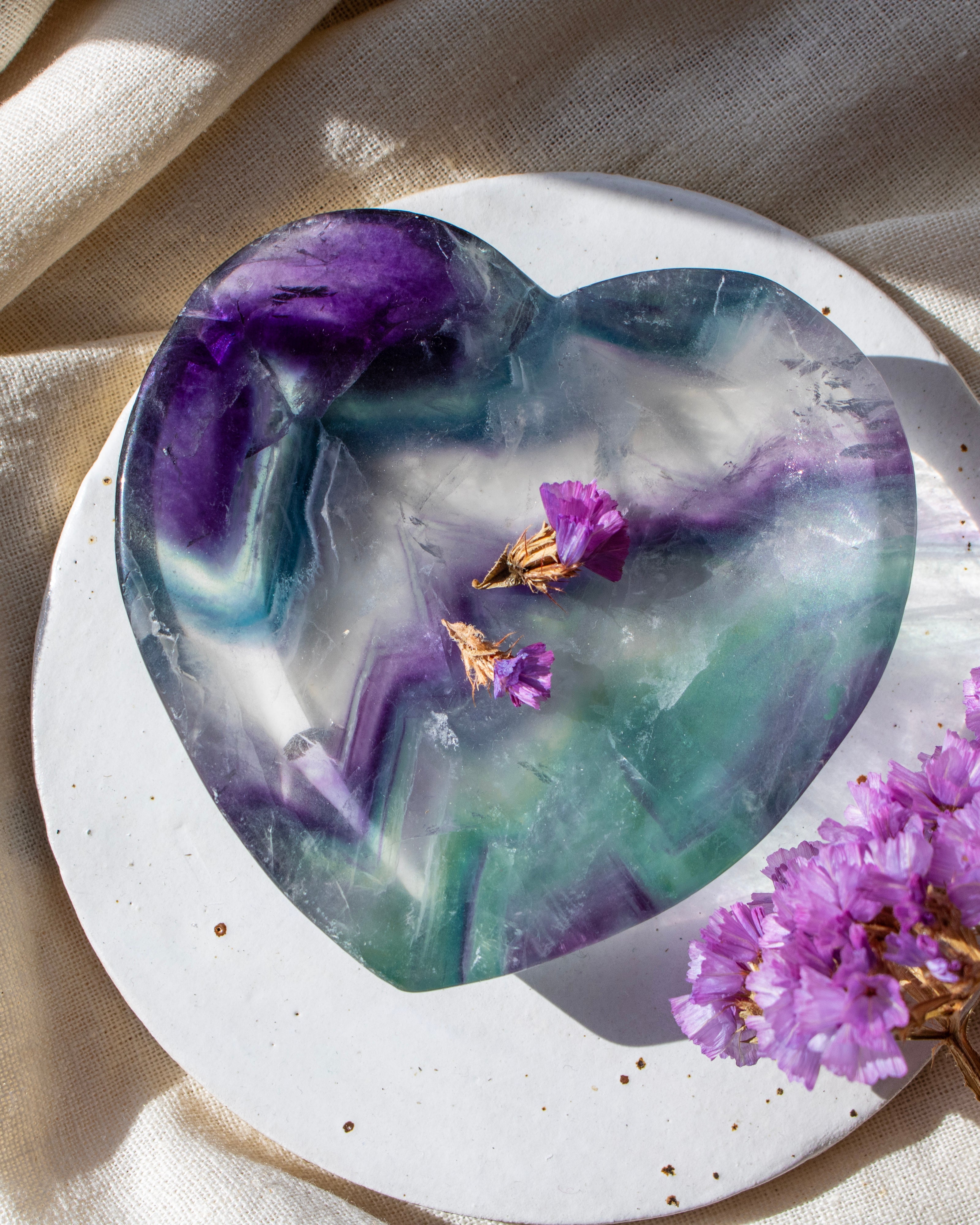 green and purple stone heart with purple flowers