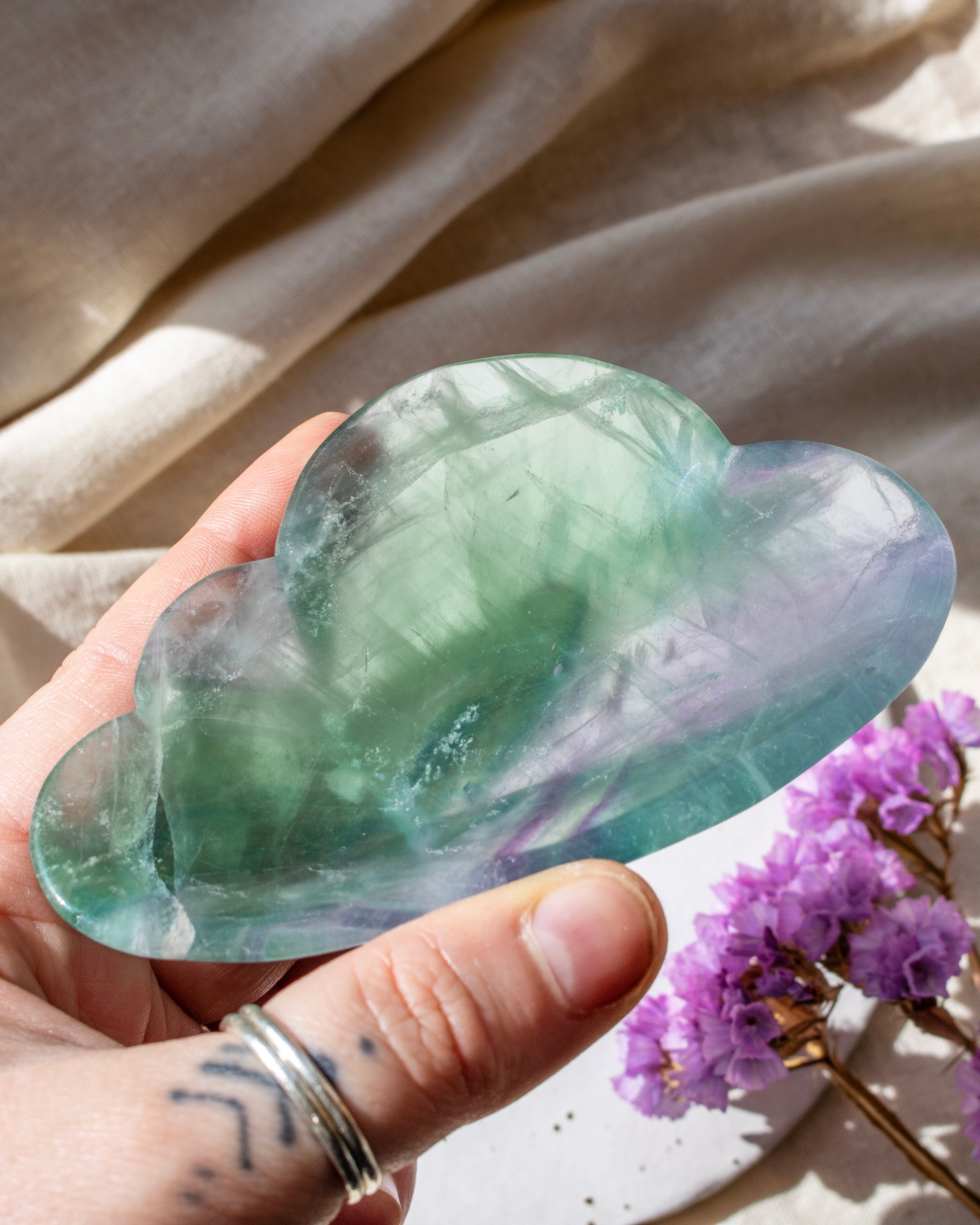 green and purple stone cloud with purple flowers