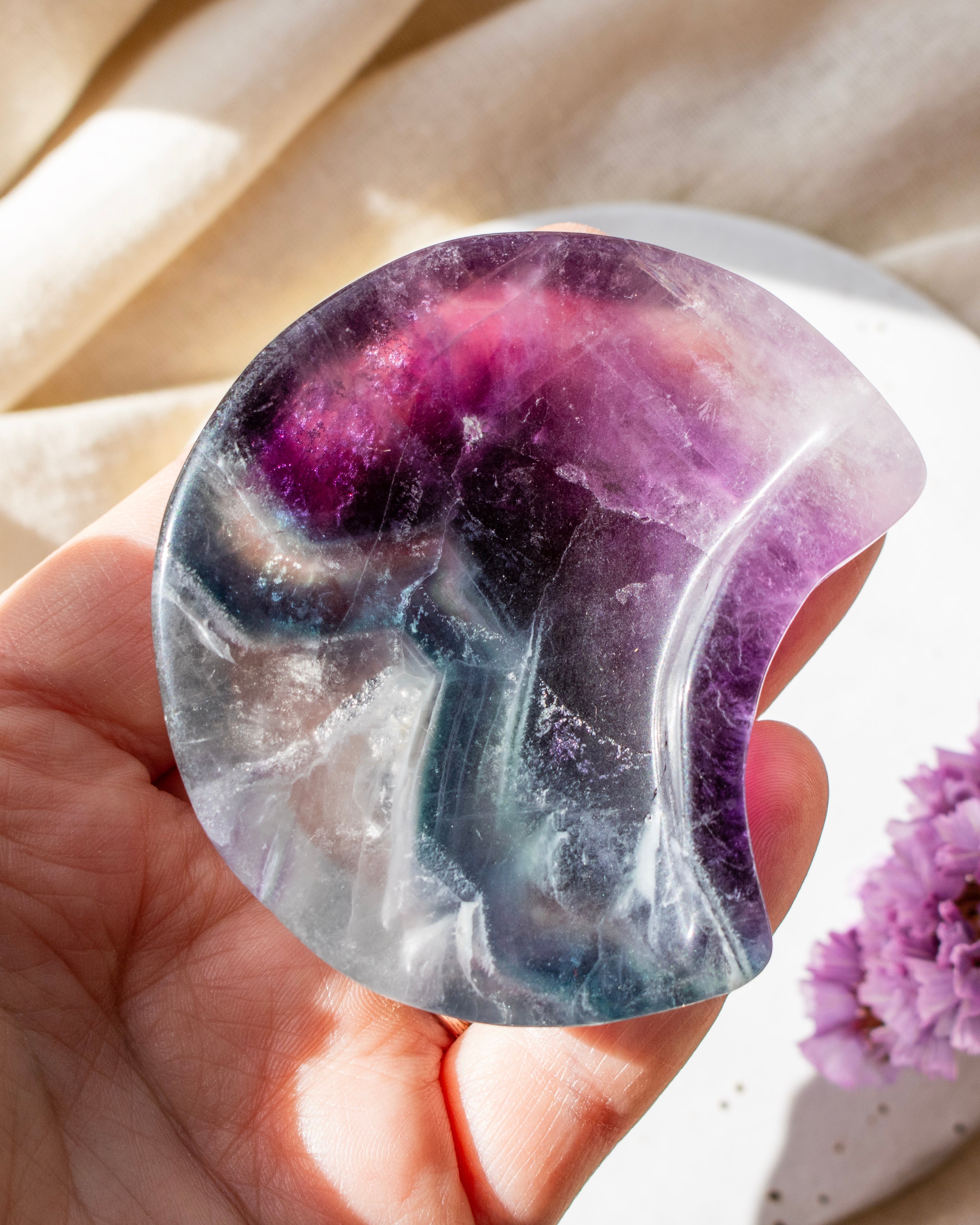 green and purple stone moon with purple flowers