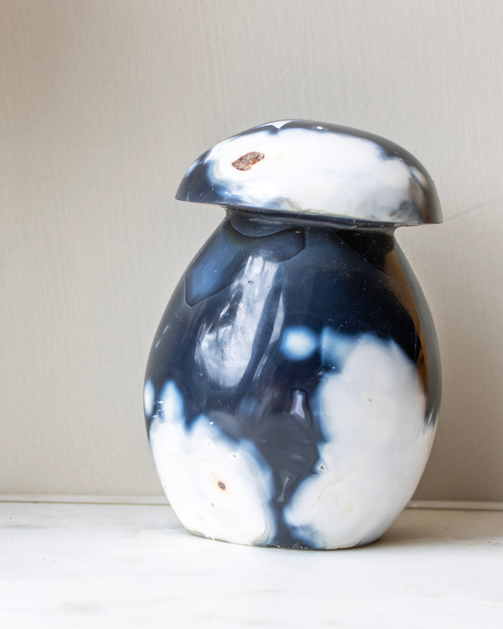 Marble-patterned agate on a neutral background