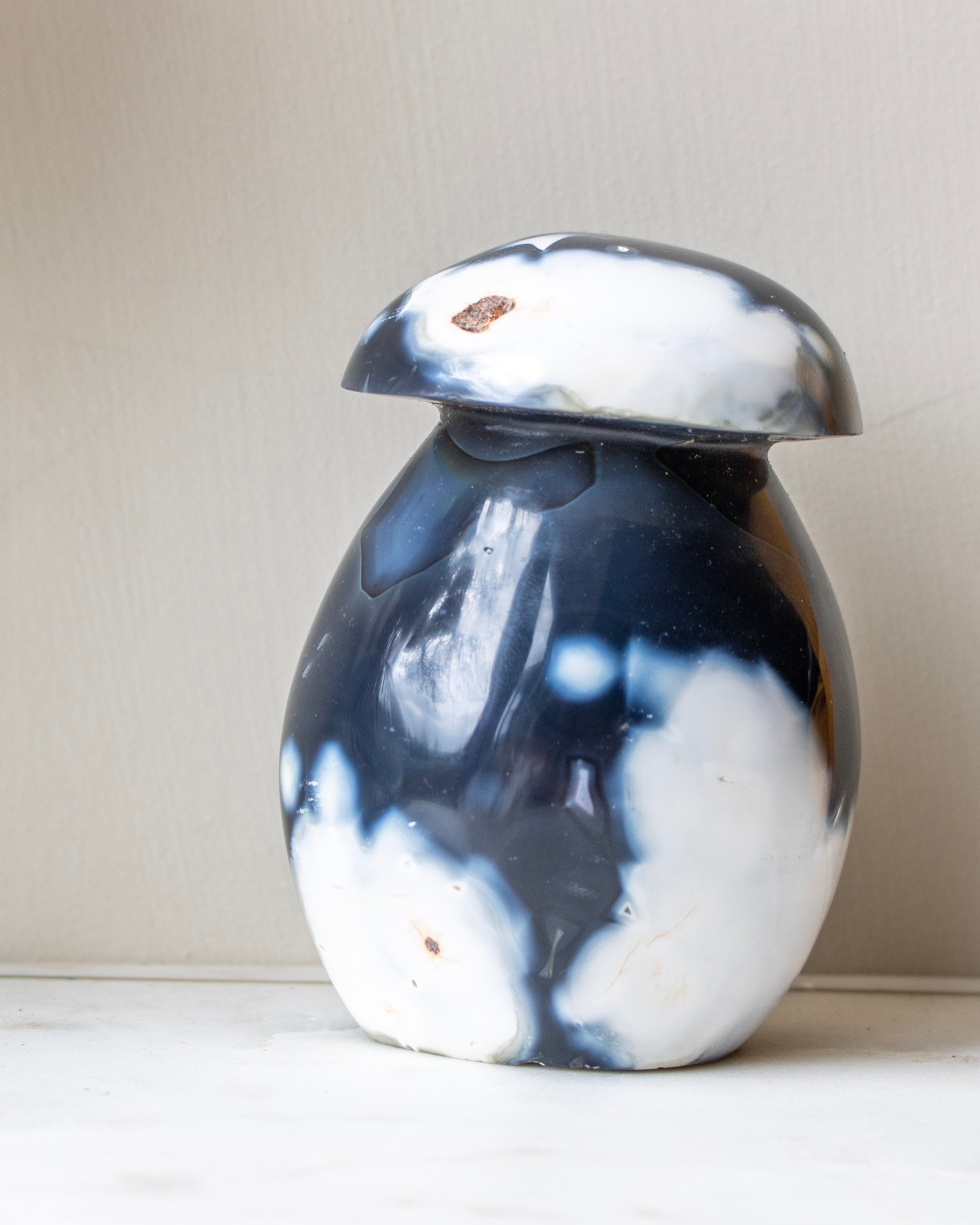 Marble-patterned agate on a neutral background