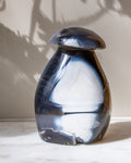 Agate mushrrom-shape on a light background