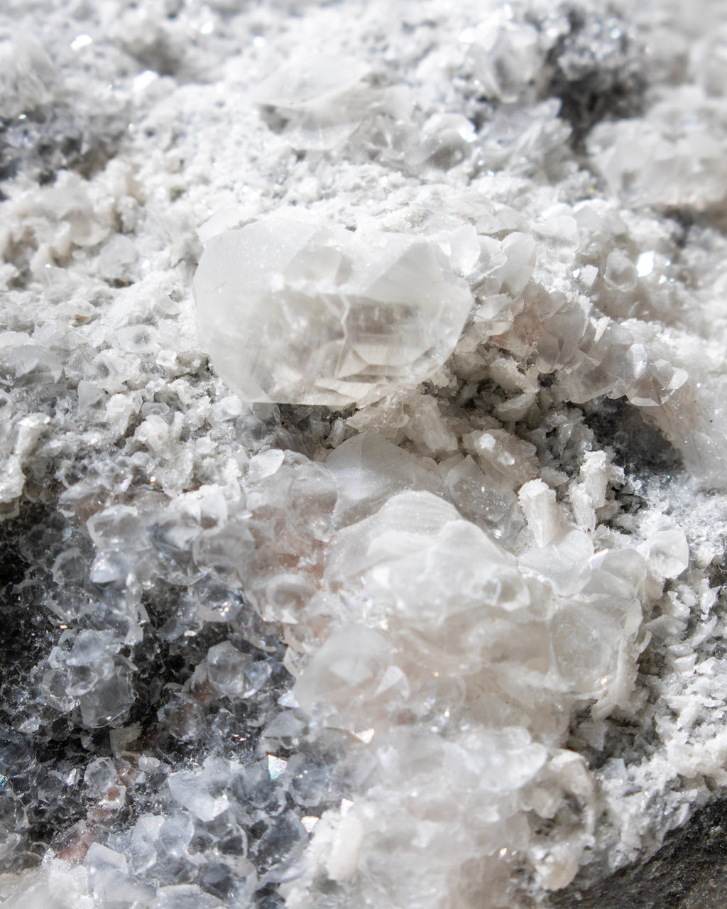 Close-up of a crystal formation on a dark background