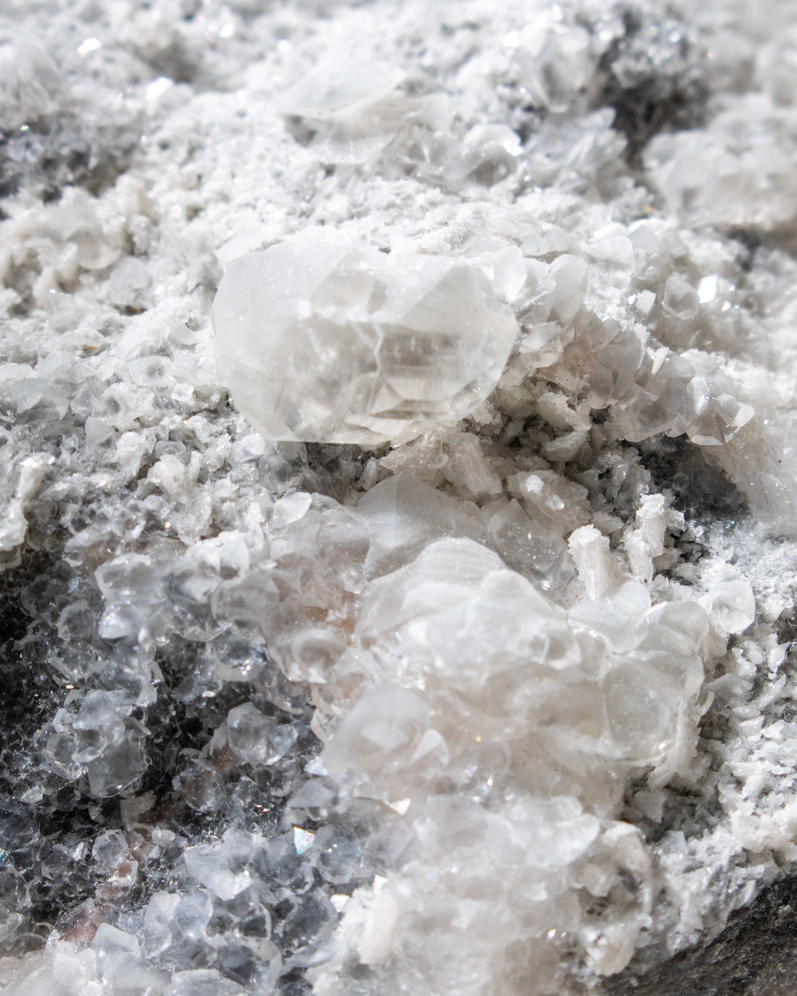 Close-up of a crystal formation on a dark background