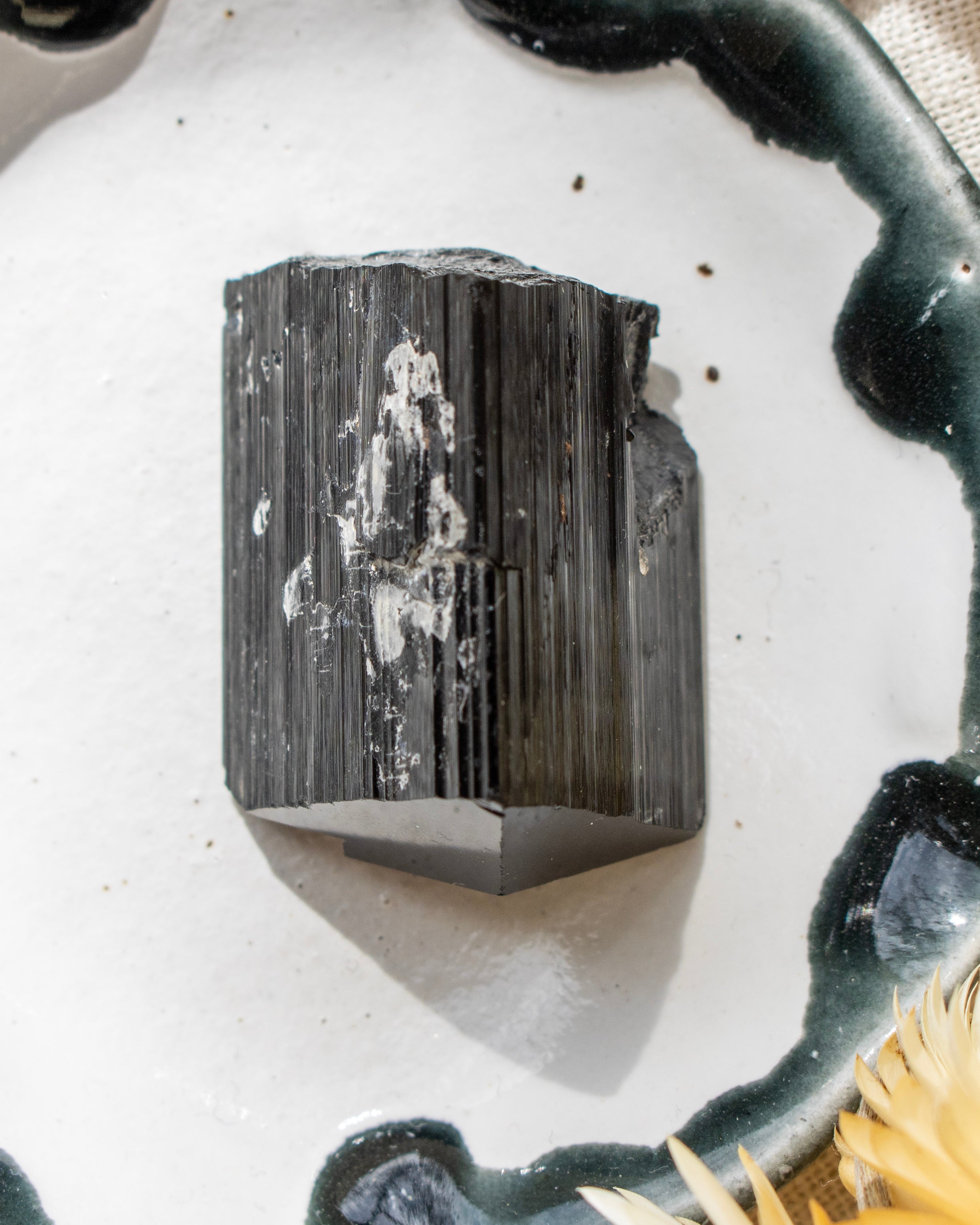Mineral sample on a decorative stone surface