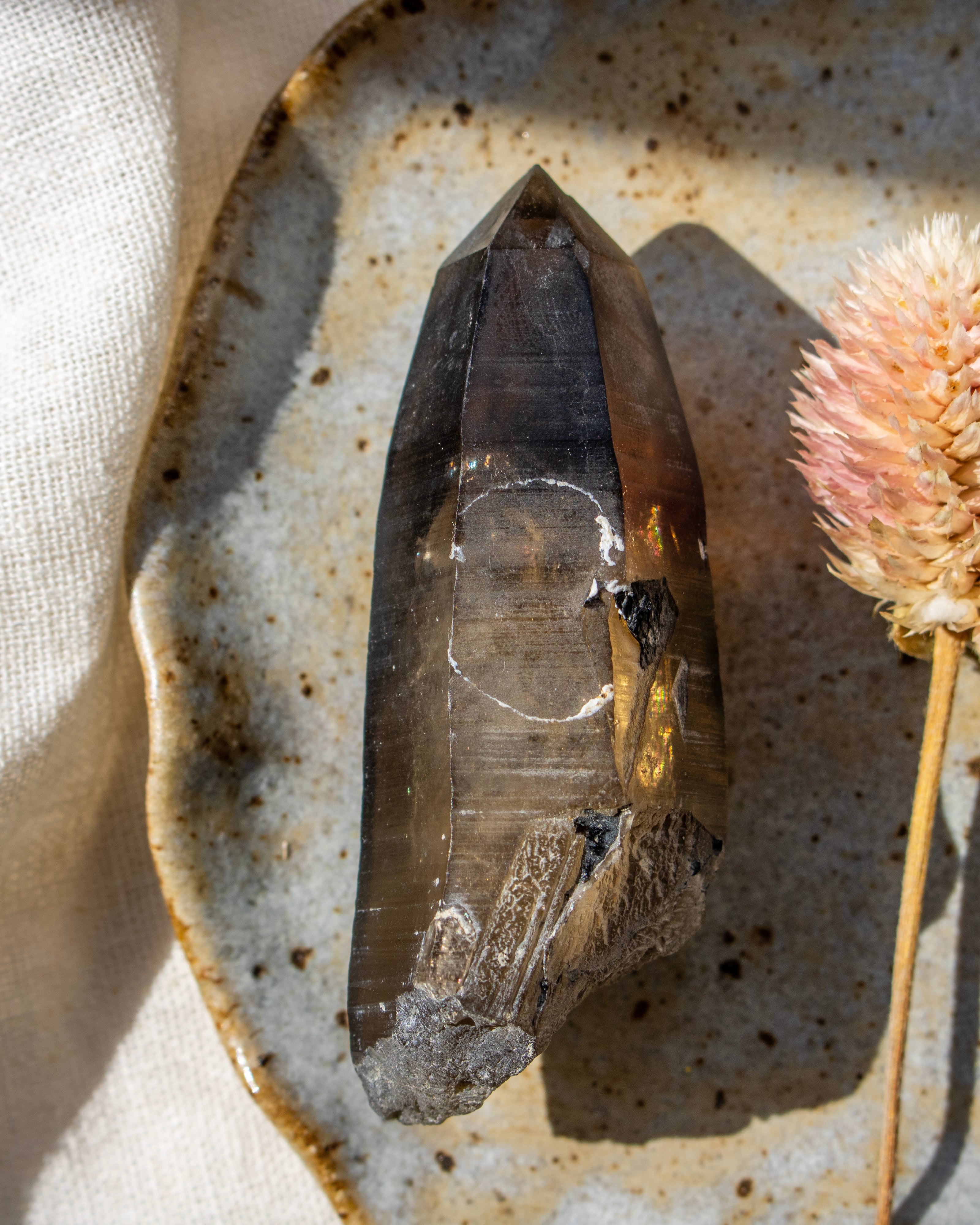 Crystal on a textured surface with a natural background