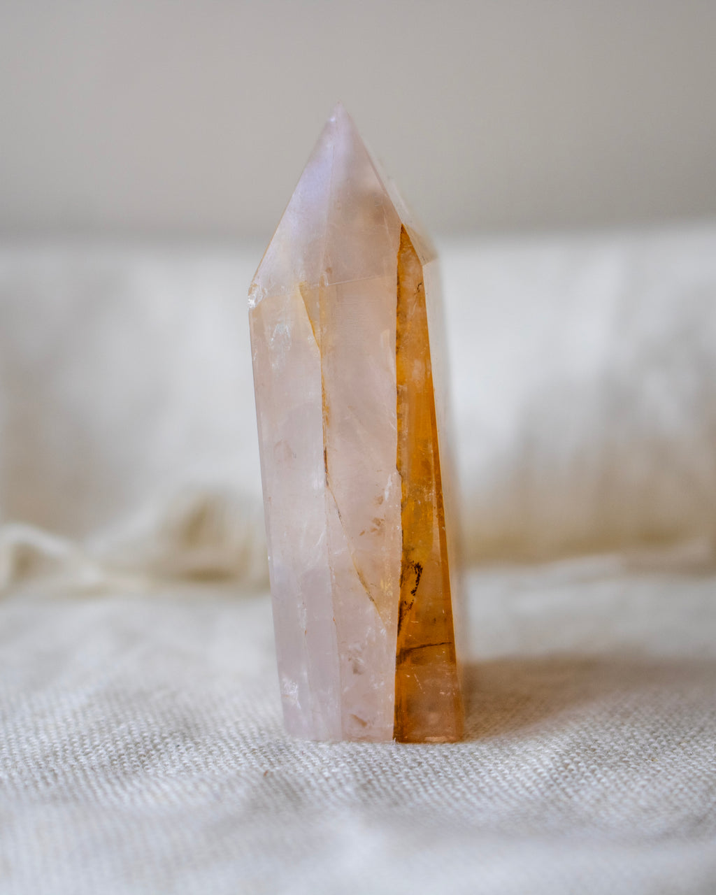 Crystal tower on a textured fabric background