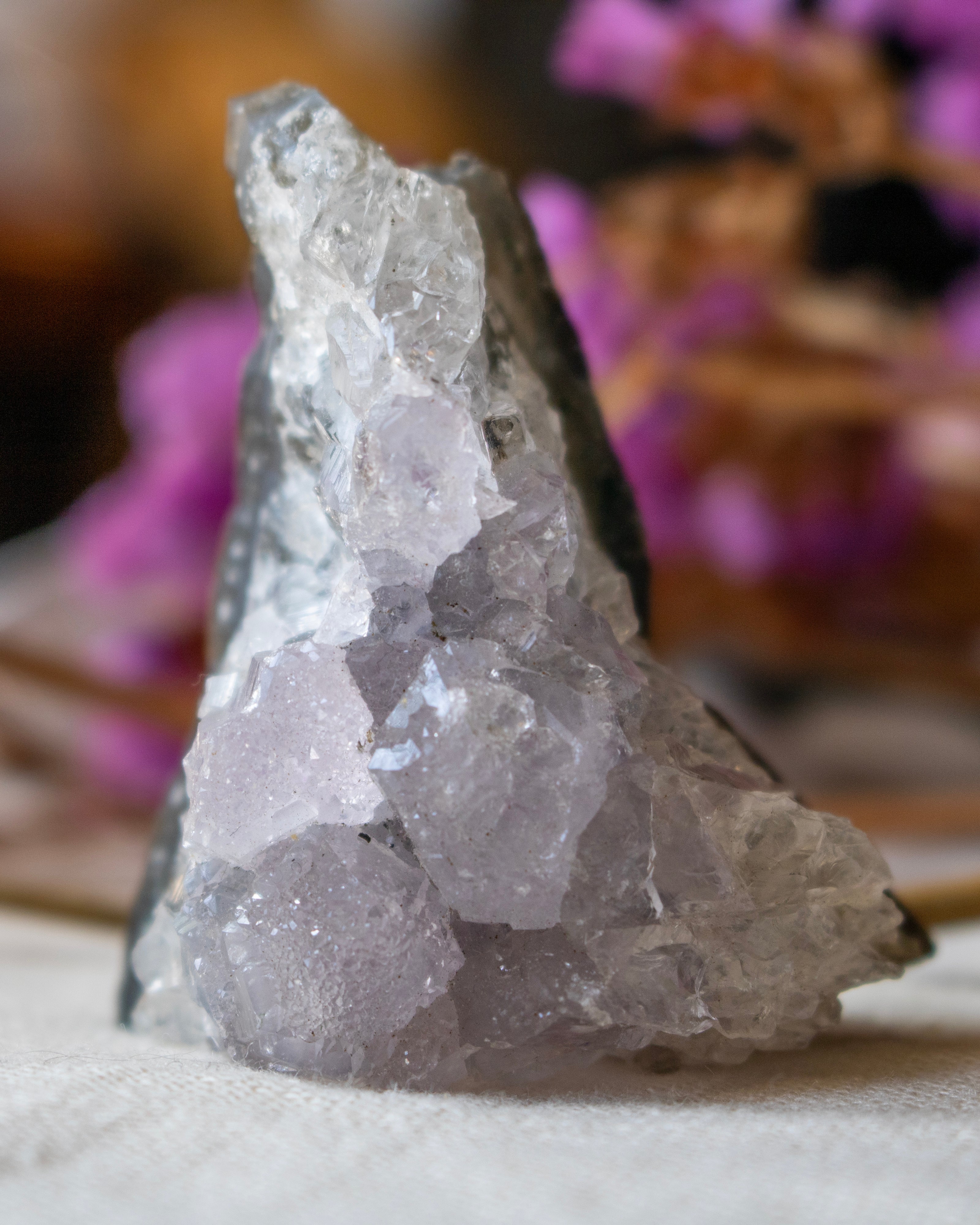 Crystal formation on a white surface with a blurred background